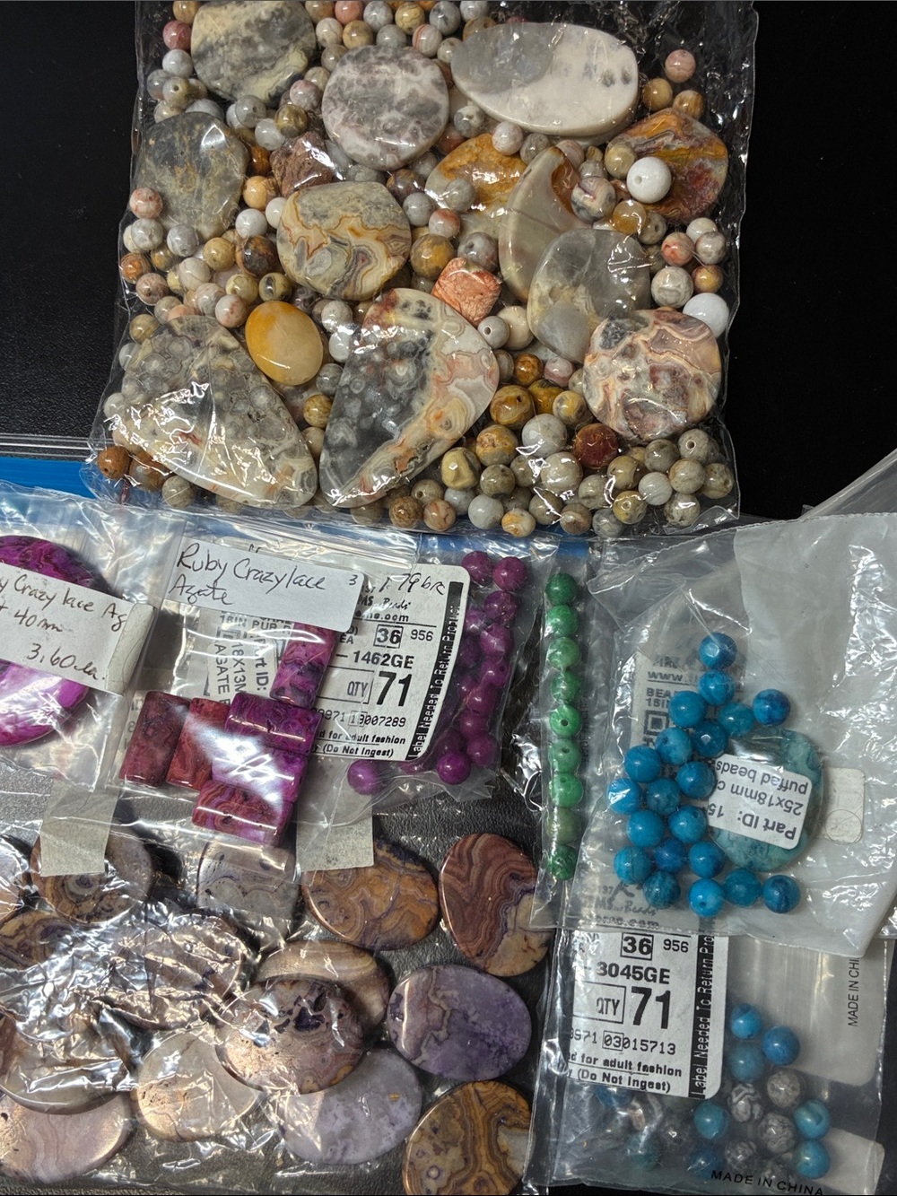 Lot of assorted crazylace agate gemstone beads and pendant gemstones